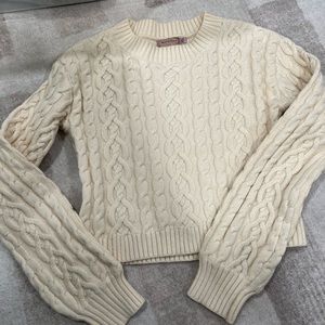 Knitted cable sweater